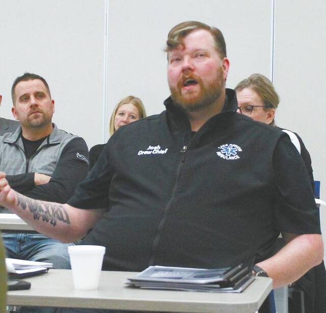 Josh Bierman, Crew Chief of the Lake Region Ambulance Service, had some questions about funding for transportation for people to and from healthcare facilities in rural North Dakota.
                                 Photos by Louise Oleson, DLJ