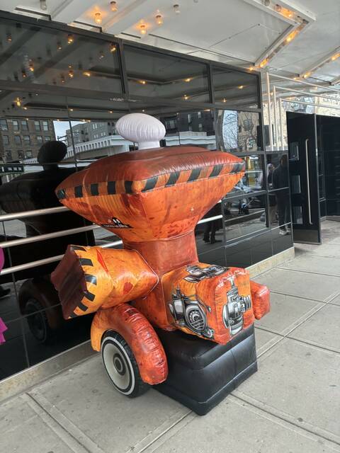 An inflatable woodchipper is put on display on the sidewalk outside of the Fargo Theatre.
                                 Photo by Mojo Hill