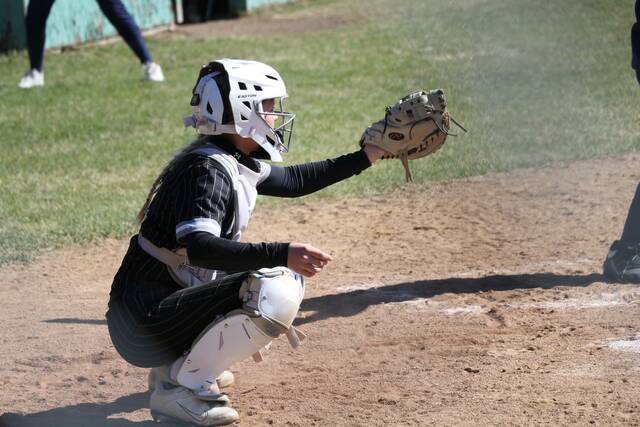 Bailey Flaagan catches one of Luehrings offerings.
                                 Photo by Mojo Hill