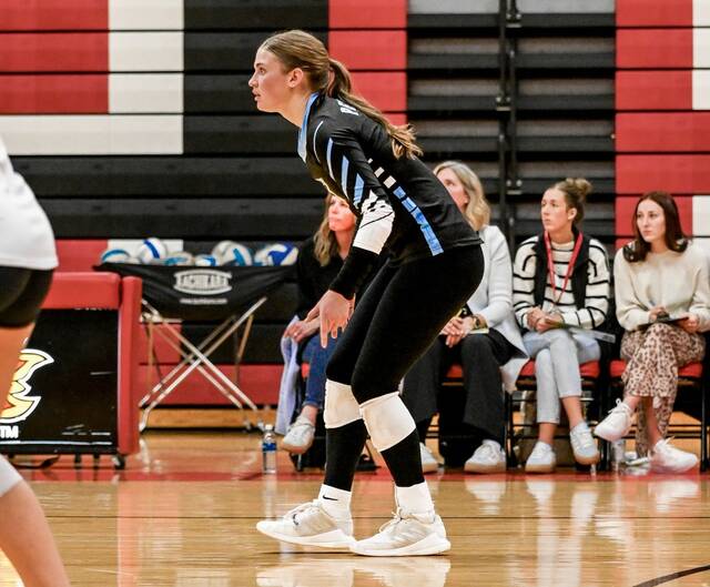 Ava Peterson gets in position before a point during the Region 2B volleyball tournament in Devils Lake.
                                 Photo by Cameron Carlson