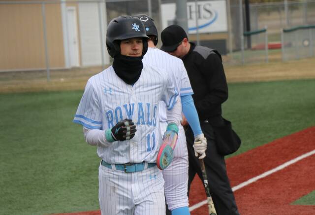 Beau Brodina crosses home plate.
                                 Photo by Mojo Hill