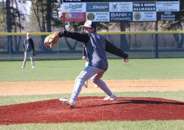 Nelson Countys Caleb Rainsberry dials up to deliver a pitch.
                                 Photo by Mojo Hill