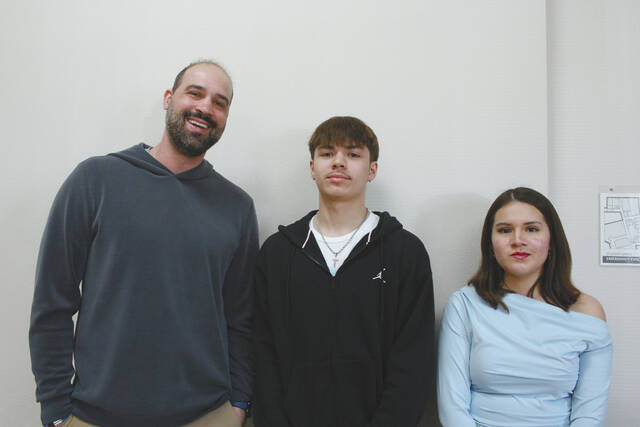 Travis Mertens presented Four Winds High School Valedictorian Joliese Hunt and Jonte Delorme, Salutatorian.