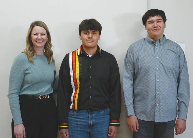 Jorden Lunde presented Minnewaukan High Schools Valedictorian Asa Morgan and Carter Ironheart, Salutatorian.