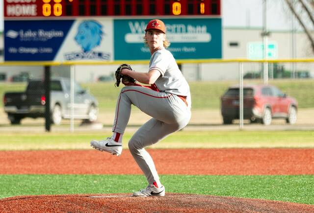 Cayden McCarthy gears into his windup.
                                 Photo by Cameron Carlson