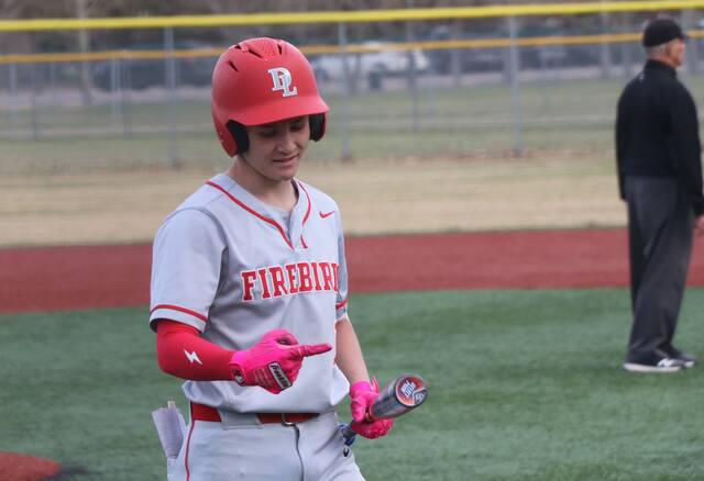 Max Palmer points and smiles after an at-bat.
Photo by Mojo Hill