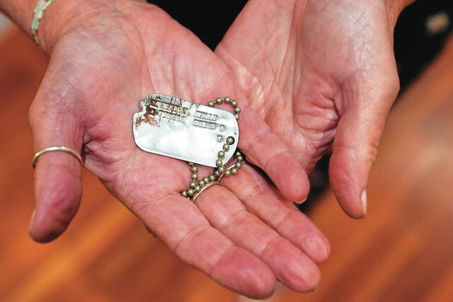 Diane Christie holds a recovered dog tag belonging to her uncle, World War II U.S. Army Air Forces 2nd Lt. Thomas Kelly, Friday, May 23, 2025, in San Leandro, Calif.
AP File Photo/Godofredo A. Vásquez