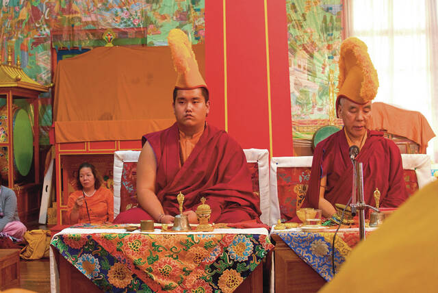 Jalue Dorje attends a ritual with other monks at Dzarong Thubten Mindrol Dongä Monastery in Kathmandu, Nepal, Tuesday, April 14, 2026.
                                 AP Photo/Niranjan Shrestha