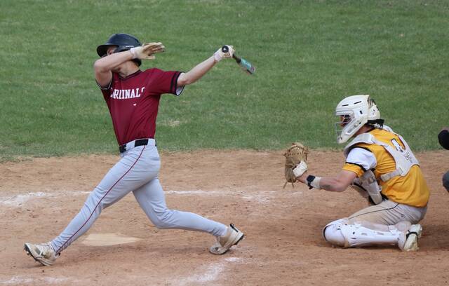 Sam Davis takes a swing at the plate for the Cardinals.
Photo by Mojo Hill