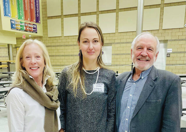 Rep. Liz Conmy, from left, candidate Anastassiya Andrianova and Sen. Tim Mathern pose for a photo in February 2026 after being endorsed by the Democratic-NPL Party in District 11.
                                 Photo courtesy of the Dem-NPL Party