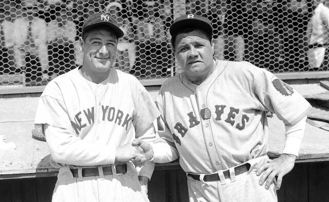 Former New York Yankees teammates Babe Ruth, right, and Lou Gehrig pose together at a spring training game in St. Petersburg, Fla., March 16, 1935 as they met for the first time after Ruth left the Yankees for the Boston Braves.
AP File Photo/Tom Sande