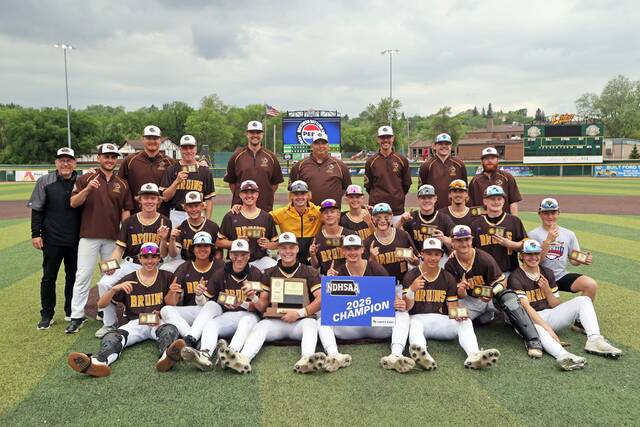 The Fargo South baseball team poses after winning its second state baseball title at Corbett Field in Minot.
                                 Photo by David Samson (courtesy of NDHSAA)