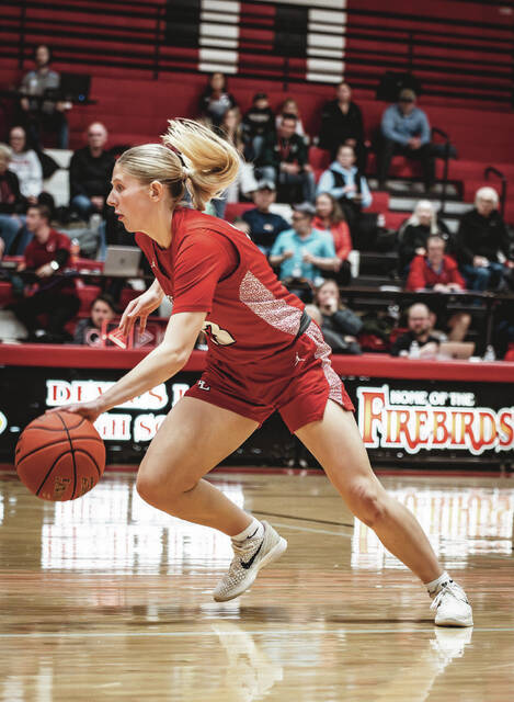 Tylie Brodina drives into the paint during a basketball game at the Devils Lake Sports Center.
Photo by Cameron Carlson