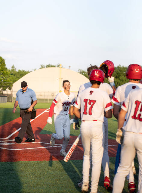 Ben Brodina runs to celebrate with his teammates after hitting a grand slam against the West Fargo Vets at DLYA Field.
Photo by Cameron Carlson