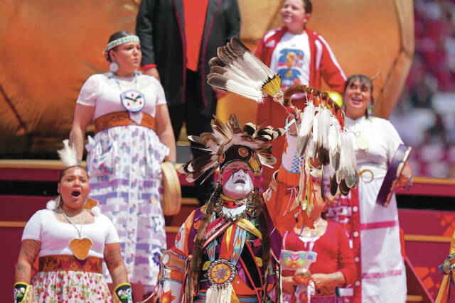 First Nation people perform during the opening ceremony for the World Cup Group B soccer match between Canada and Bosnia in Toronto, Friday, June 12, 2026.
                                 AP Photo/Stephanie Scarbrough