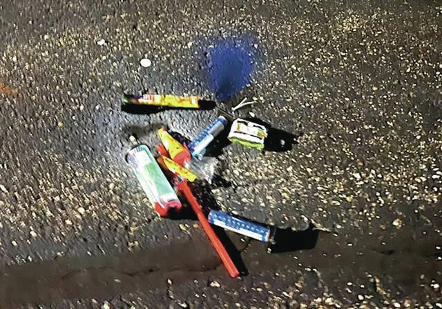 The remains of detonated small fireworks used on Saturday, July 4.
                                 Photo by Mark C. Robinson, DLJ
