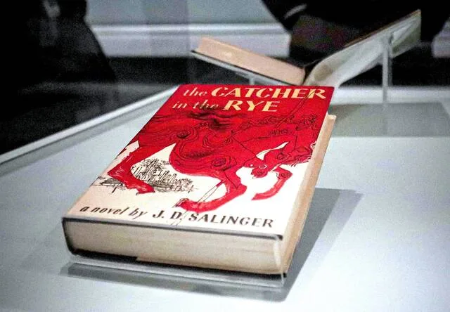 A first-edition copy of the novel The Catcher in the Rye, part of a J.D. Salinger exhibit at the New York Public Library on Oct. 16, 2019, in New York. It was first published on July 16, 1951.
                                 AP Photo/Bebeto Matthews, File