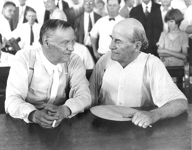 Defense attorney Clarence Darrow, left, and prosecutor William Jennings Bryan speak with each other during the Scopes monkey trial in July 1925, in Dayton, Tenn.
                                 AP Photo, File