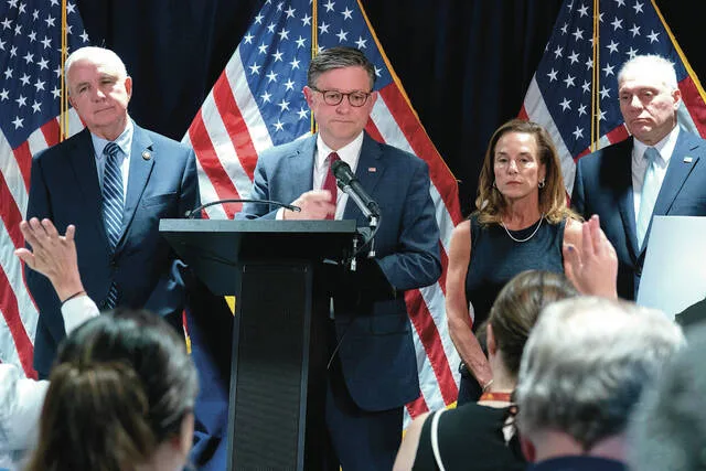 Speaker of the House Mike Johnson (R-La.), flanked by Rep. Carlos Giménez (R-Fla.), from left, Chair of the House Republican Conference, Rep. Lisa McClain (R-Mich.), and House Majority Leader Steve Scalise (R-La.), speaks during a news conference on Capitol Hill, Tuesday, July 14, 2026, in Washington.
                                 AP Photo/Jose Luis Magana