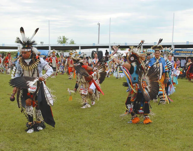 Scenes from past Fort Totten Days Wacipi.
                                 Photos by Louise Oleson, DLJ