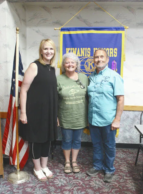 Lisa Crosby thanks Dawn and Buck Hamre for their presentation about the Devils Lake Chapter of Fishing Has No Boundaries at the Tuesday, July 14 Devils Lake Kiwanis CLub meeting.