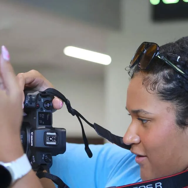 Aurora Roseburr, Choctaw Nation, practices using a camera at a journalism workshop held July 6-10, 2026.
                                 Courtesy photo