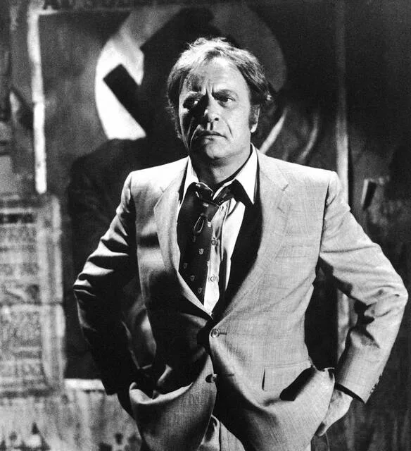Actor Vic Morrow, seen here on one of the sets of Twilight Zone - The Movie, was one of three actors killed during its production on July 23, 1982, in a helicopter stunt gone wrong.