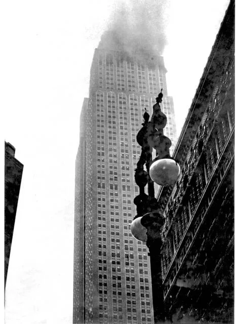 Smoke billows from the Empire State Building in New York, July 28, 1945, after an Army B-25 bomber enroute to Newark Airport crashed into the upper floors of the structure. Fires were started on the upper eleven floors of the building.
AP Photo, file
