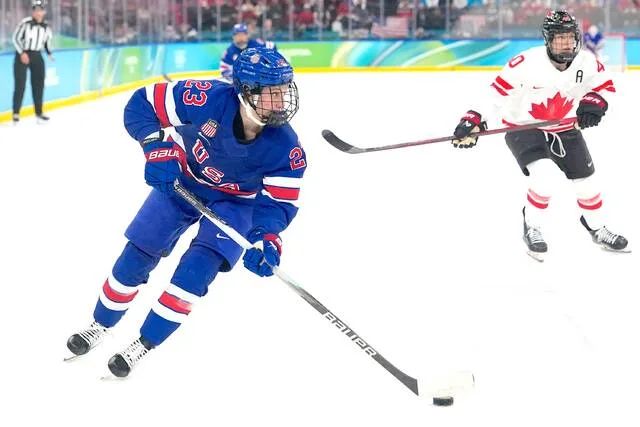 United States Hannah Bilka (23) is in action during a womens ice hockey gold medal game between the United States and Canada at the 2026 Winter Olympics in Milan, Italy, Feb. 19, 2026.
                                 AP Photo/Hassan Ammar, File