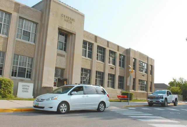 Even the front of CMS had a couple more vehicles parked outside.