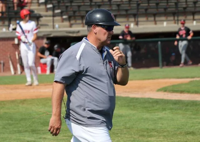 Eric Nygaard walks towards the first-base coaching area during the 2026 Class A Legion baseball state tournament at Ardean Aafedt Stadium in Williston.
                                 Photo by Mojo Hill