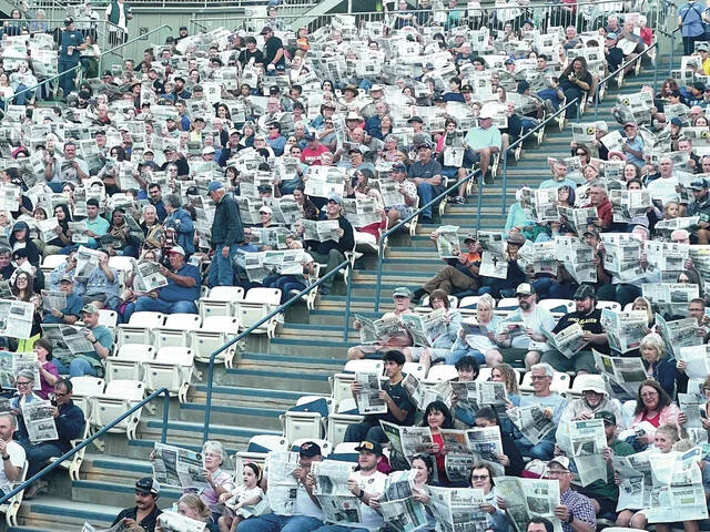 On Saturday, Aug. 15 the North Dakota Newspaper Association (NDNA) teamed up with the organizers of the Medora Musical, who were featuring a skit on newspapers, to place 2,000 newspapers beneath the seats of audience members in attendance. Before the show, after receiving a little information about NDNAs READ Local program, everyone held up their newspapers, sourced from around the state, collectively representing most of North Dakotas 71 newspapers.
Photos provided by NDNA
