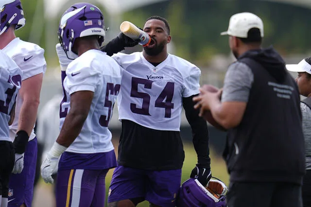 Minnesota Vikings linebacker Jamal Adams (54) hydrates during the teams NFL football training camp Wednesday, July 29, 2026, in Eagan, Minn.
                                 AP Photo/Abbie Parr