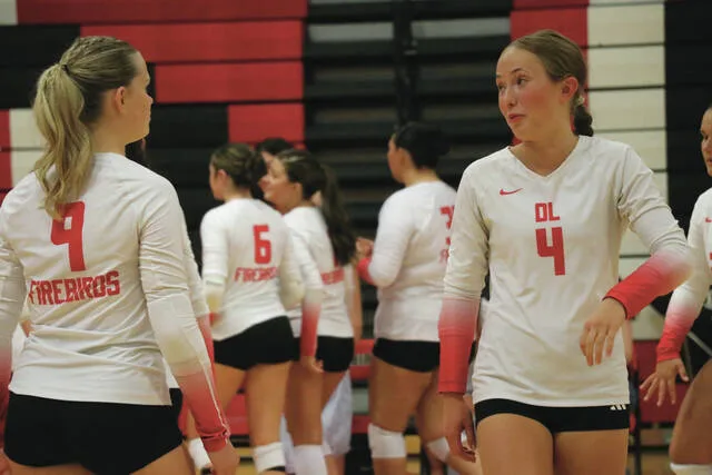 Emma Hofstad (right) shares a laugh with Riley Remmick (left) in between points.
                                 Photo by Mojo Hill