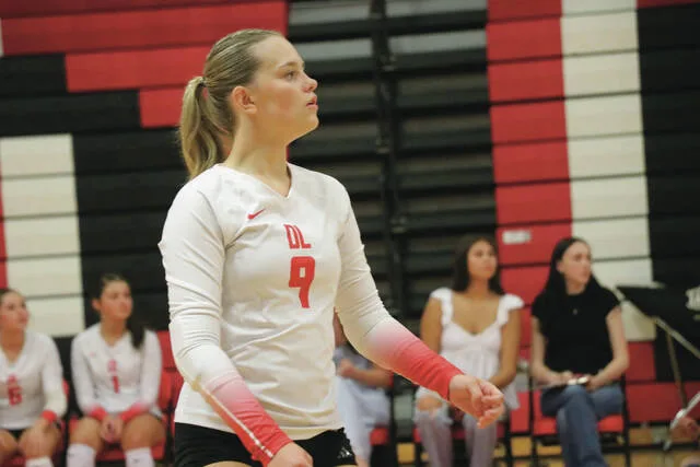 Riley Remmick watches as the ball goes over to the other side of the court.
                                 Photo by Mojo Hill