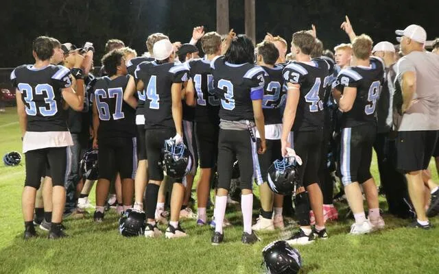The 2026 New Rockford-Sheyenne/Maddock team celebrates its season-opening win at New Rockford Athletic Field.
Photo by Mojo Hill