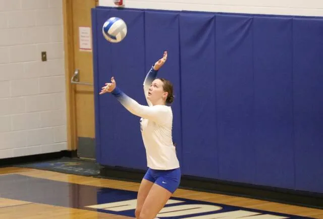 Lacie Fautsch serves the volleyball during Benson Countys match against TGU in Leeds on Thursday, Sept. 3.
                                 Photo by Mojo Hill