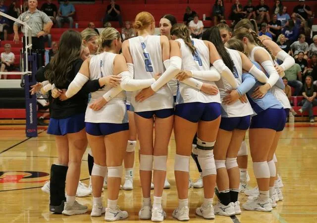 The 2026 Lake Region State College volleyball team comes together in a huddle during a match at the Devils Lake Sports Center.
                                 Photo by Mojo Hill