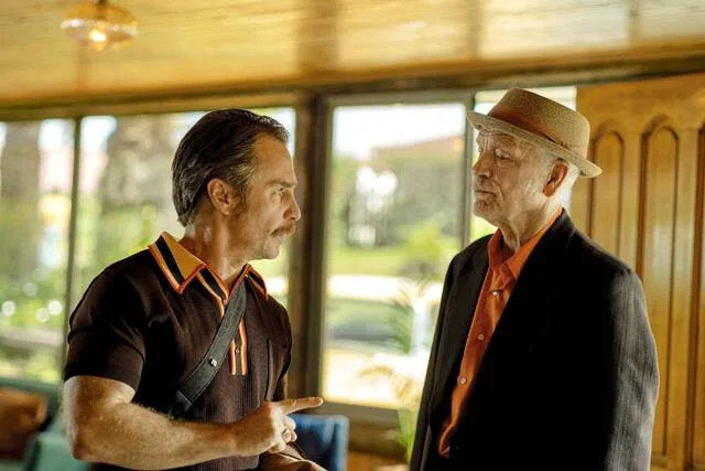 Sam Rockwell and John Malkovich star as two CIA agents in the 1970s-era dark comedy Wild Horse Nine, debuting in theaters on Nov. 6.
                                 AP Photo, Searchlight
