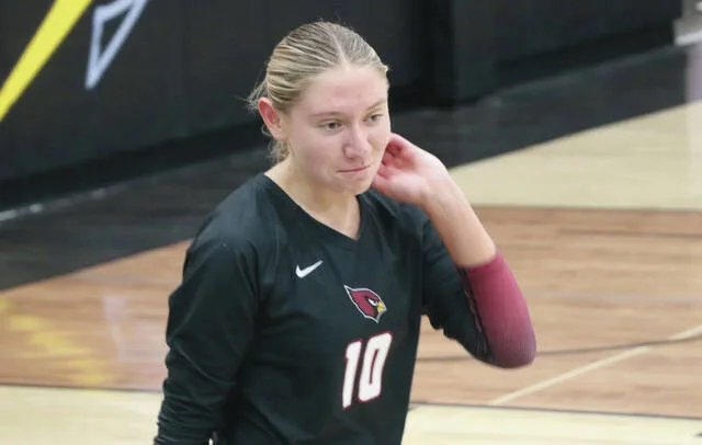 Langdon Area/Munichs Aubrey Badding returns to the bench in between points during the Cardinals match against New Rockford-Sheyenne on Thursday, Sept. 24 at New Rockford-Sheyenne Public School.
                                 Photo by Mojo Hill