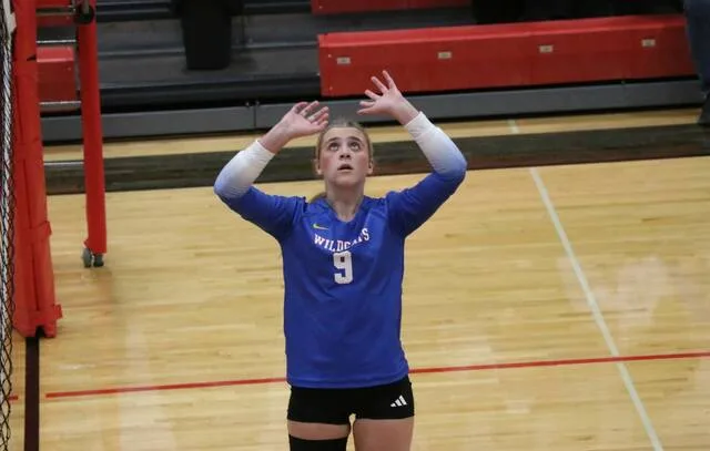 Benson Countys Liberty Streyle sets the ball for one of her hitters during the Wildcats match against the Bearcats at North Star Public School on Tuesday, Sept. 29.
Photo by Mojo Hill