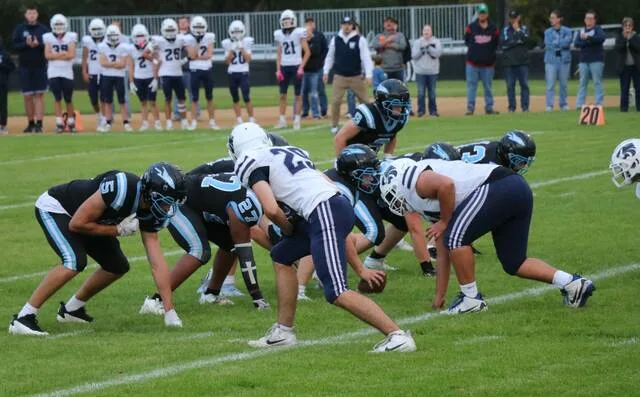 New Rockford-Sheyenne/Maddock and North Prairie get set for a play during their matchup at New Rockford Athletic Field on Friday, Sept. 18.
                                 Photo by Mojo Hill